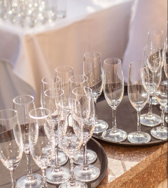 Stream to a Second venue Champagne flutes on two silver trays.